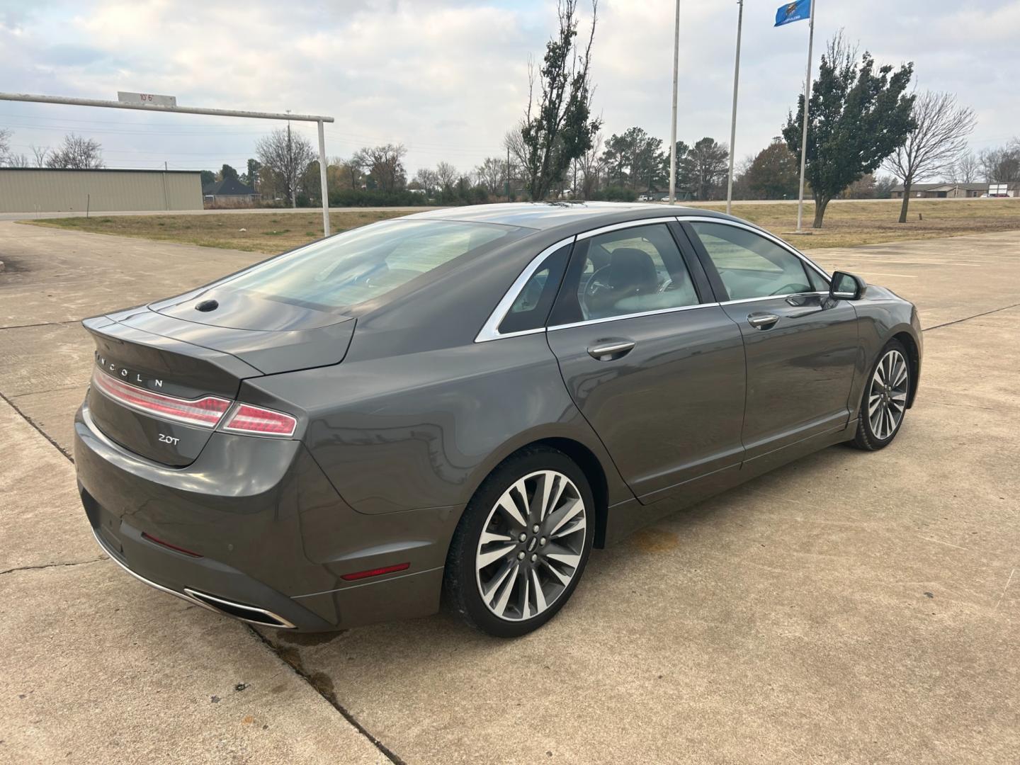 2017 GRAY Lincoln MKZ Select FWD (3LN6L5C98HR) with an 2.0L L4 DOHC 16V engine, 6A transmission, located at 17760 Hwy 62, Morris, OK, 74445, (918) 733-4887, 35.609104, -95.877060 - 2017 LINCOLN MKZ SELECT FWD 2.0L FEATURES POWER SEATS, POWER MIRRORS, POWER WINDOWS, POWER LOCKS, AM/FM STEREO, SIRIUS XM, BLUETOOTH, CD PLAYER, NAVIGATION, LEATHER SEATS, HEATED SEATS, DUAL CLIMATE CONTROL, BACKUP CAMERA, SUNROOF, MULTI-FUNCTIONING STEERING WHEEL CONTROLS, CRUISE CONTROL, TRACTION - Photo#4